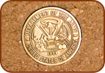 closeup army medallion on brick